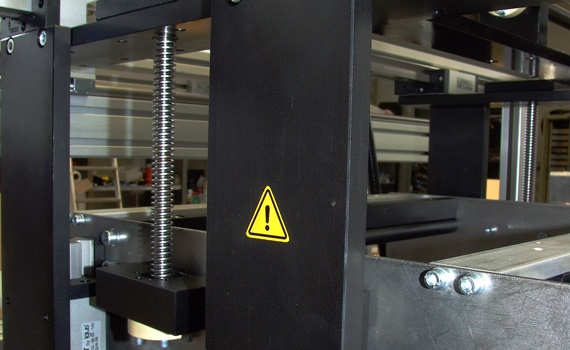 Folding and gluing machines in use